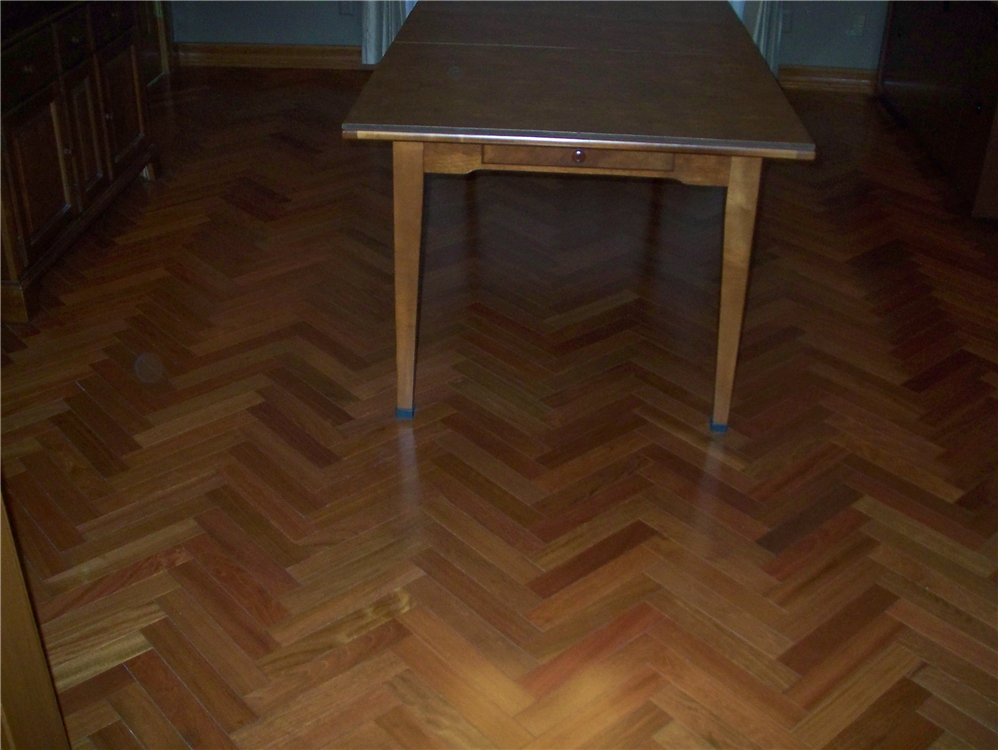Stunning hardwood floor from Mirage Hardwoods in a Herringbone pattern for client!