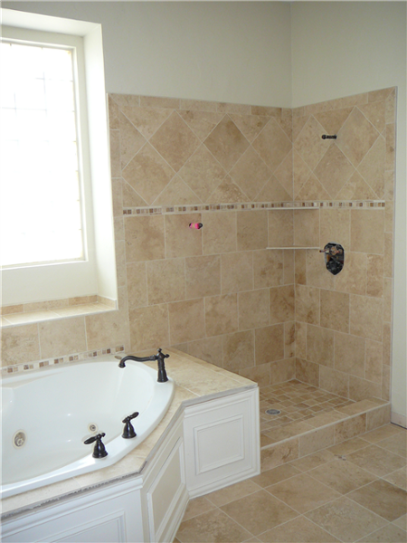 See the previous photo to see what this bathroom looked like before the tile was installed.